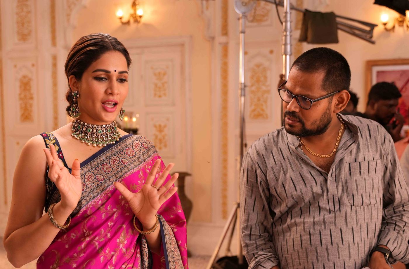 Krishna Kishore directing a lead actress on a jewellery ad set